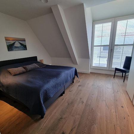 Penthouse Windkracht 10 Aan Het Strand Van Cadzand Luaran gambar